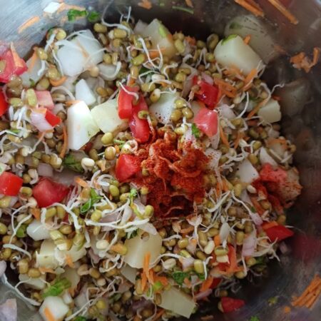 Add spices and lime juice to sprouts salad