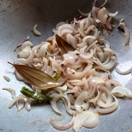 Fry onions for rice dish
