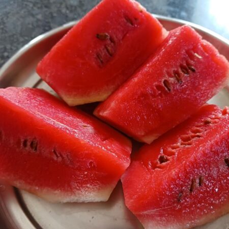 Remove rind of watermelon