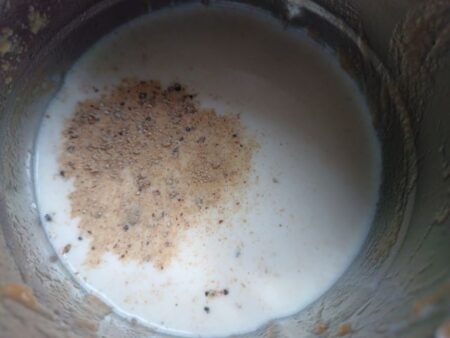 Add milk and elachi powder to sapota puree