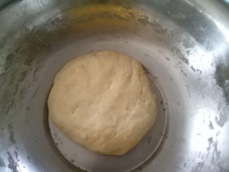 Shape bread dough into ball