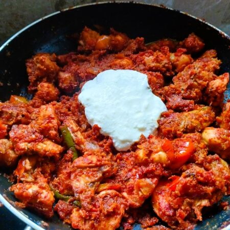 Mix in curd to chicken curry