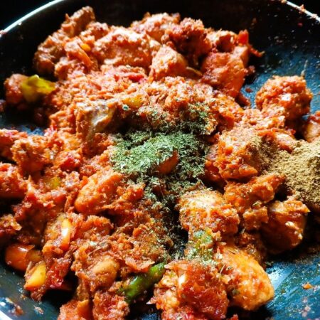 Add garam masala and kasoori methi to karahi chicken Lahori style