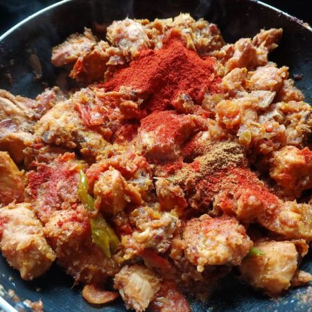 Add spices to Lahori Chicken Karahi