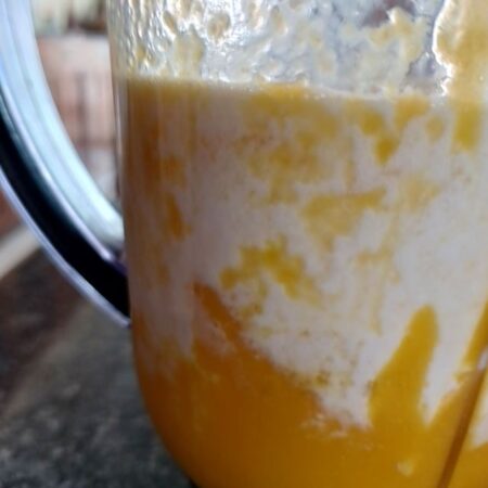Blend mango puree with milk, cream, condensed milk