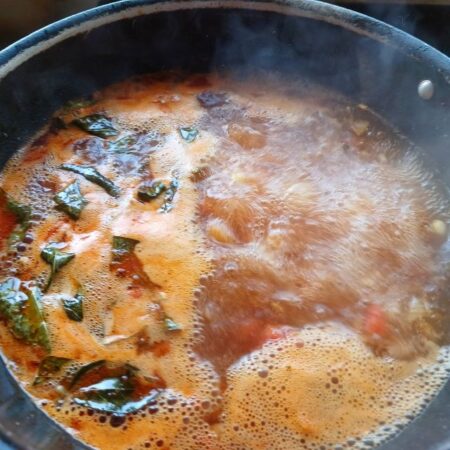 Water boiling for suji upma with tomatoes