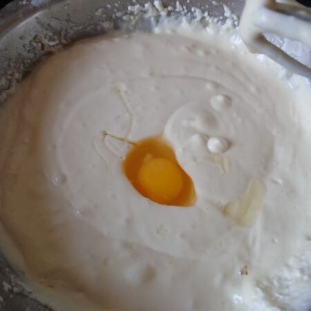 Whisk the eggs for baked vanilla and cream cheese cake