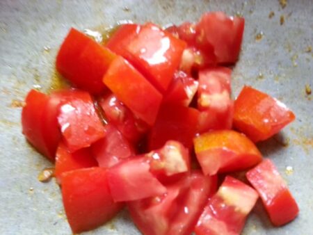 Saute tomatoes for brown chick peas curry