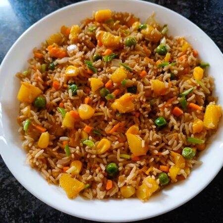 Healthy pineapple fried rice vegetarian tropical style