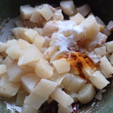 Add cooked tapioca, salt and turmeric