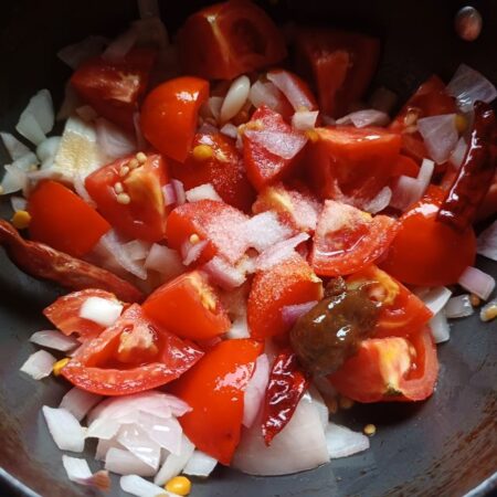 Add salt and tamarind for the Andhra chutney recipe with tomatoes and onions