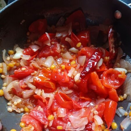 Cook till tomatoes soften