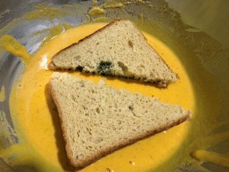 Dip bread triangles in besan batter