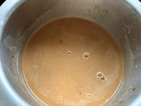 Add coffee and cornflour slurry to caramel and milk