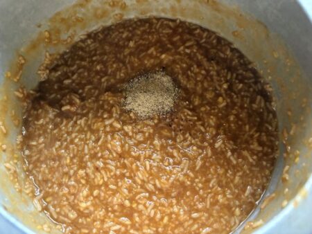 Add cardamom powder and edible camphor for Sweet Pongal with jaggery