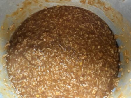 Mix the jaggery with rice and dal