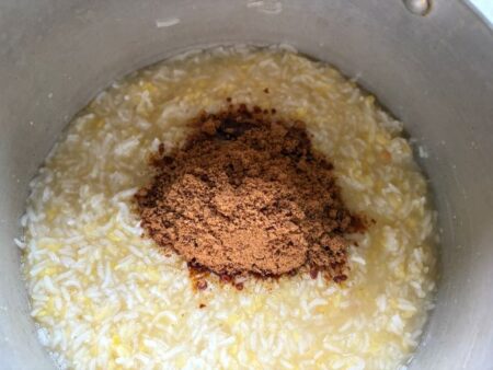Add jaggery powder to the cooed rice-dal