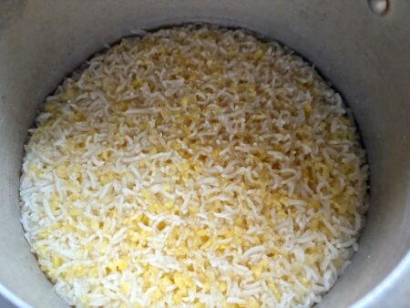 Pressure cook rice and mung dal for sakkarai pongal