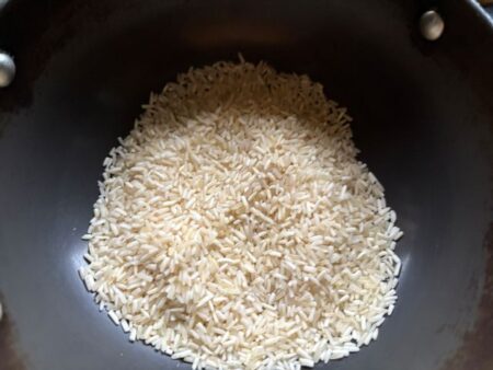 Dry Roast Raw rice on low heat