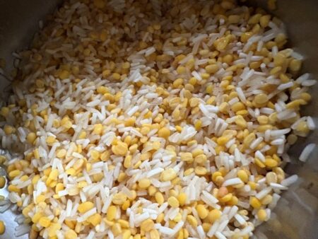 Wash rice and dal