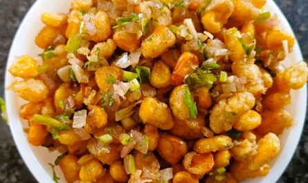 Remove crispy fried corn kernels o serving dish